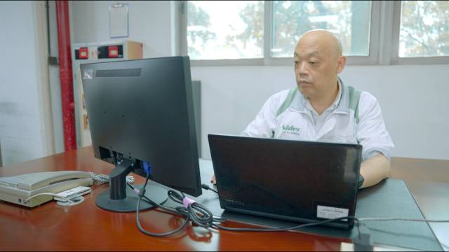 尼得科仪器总经理赤羽诚工作照。受访者供图